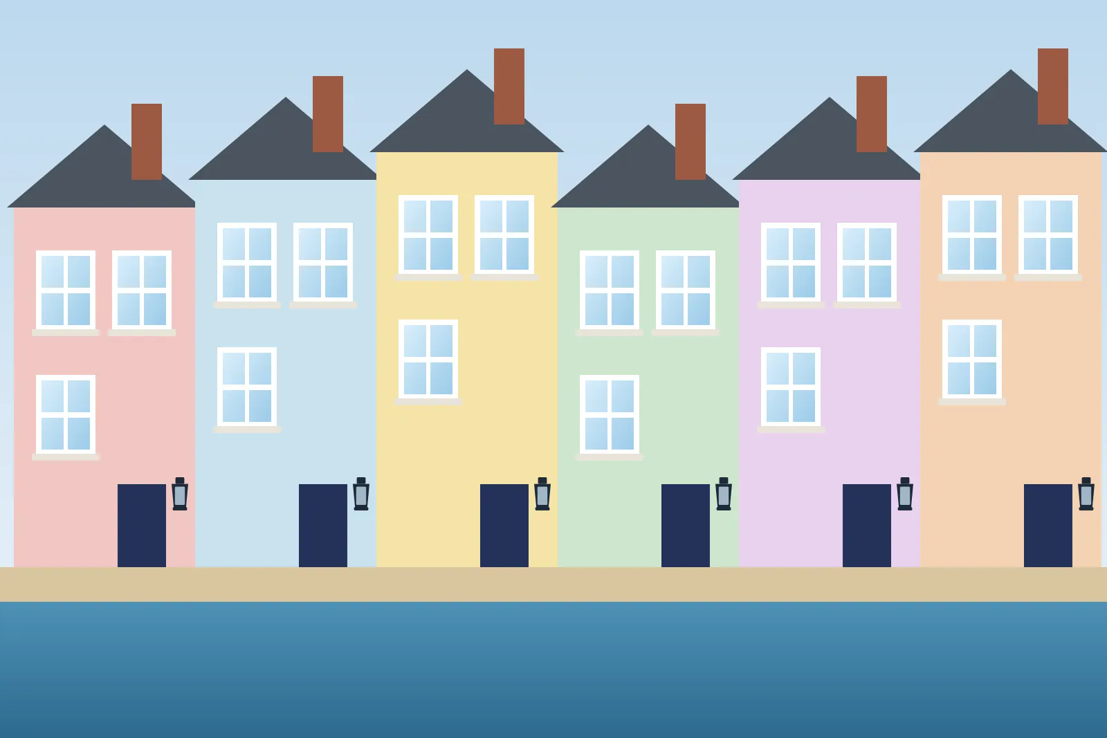 Colourful terraced houses along the seafront of a British coastal town