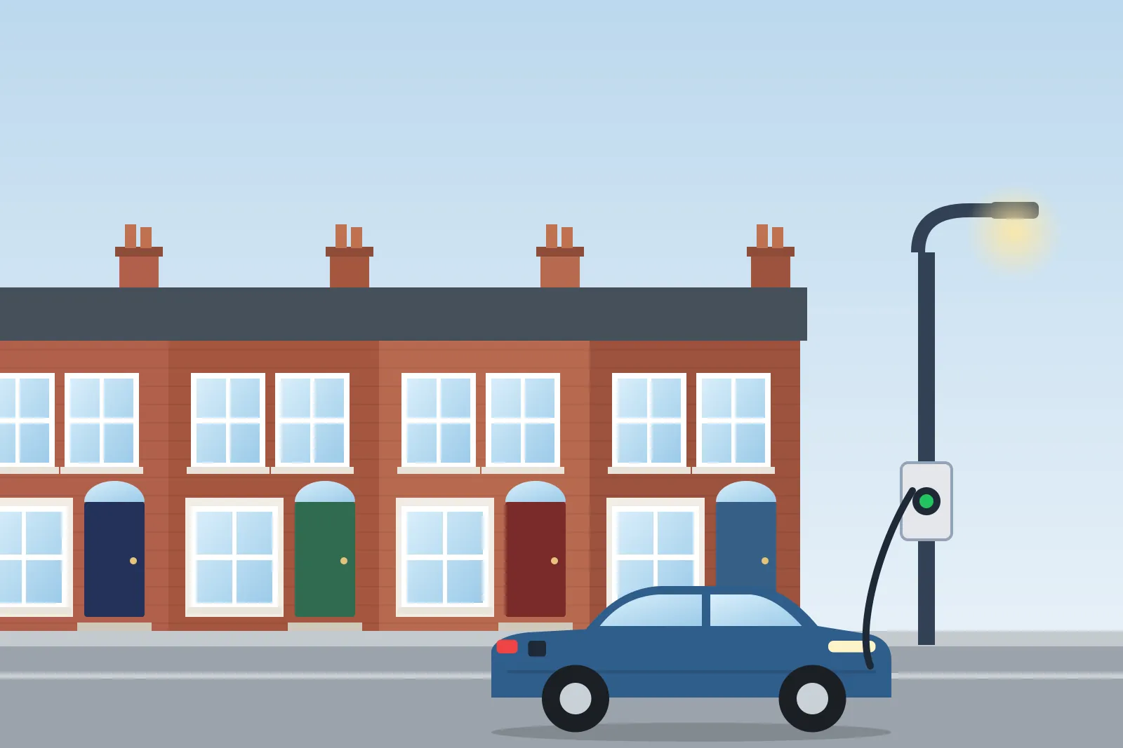 Terraced street with a car charging from a charge point on a lamp post