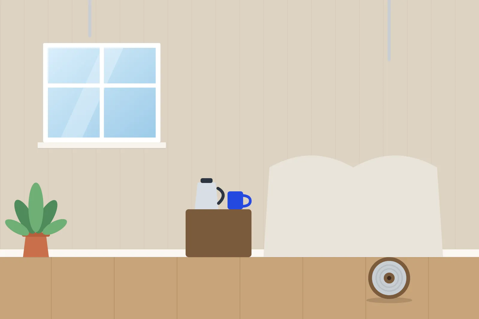 Living room with furniture under dust sheets, a kettle and mug on a table and cables hanging from the ceiling