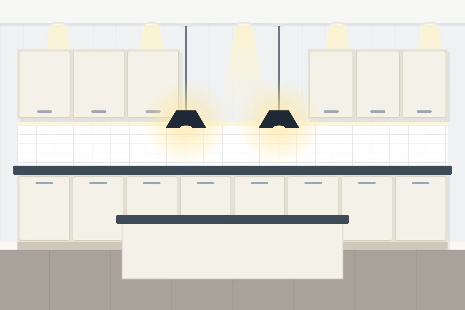 Kitchen lit by recessed ceiling downlights and two pendant lights over an island